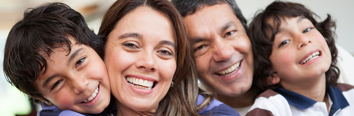 A smiling family.